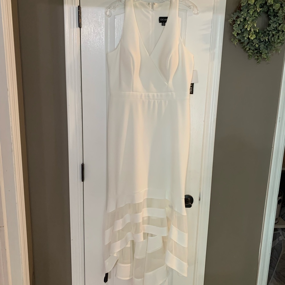 Xscape Manhattan dress. Size 14. Never worn but minor mark shown in picture.